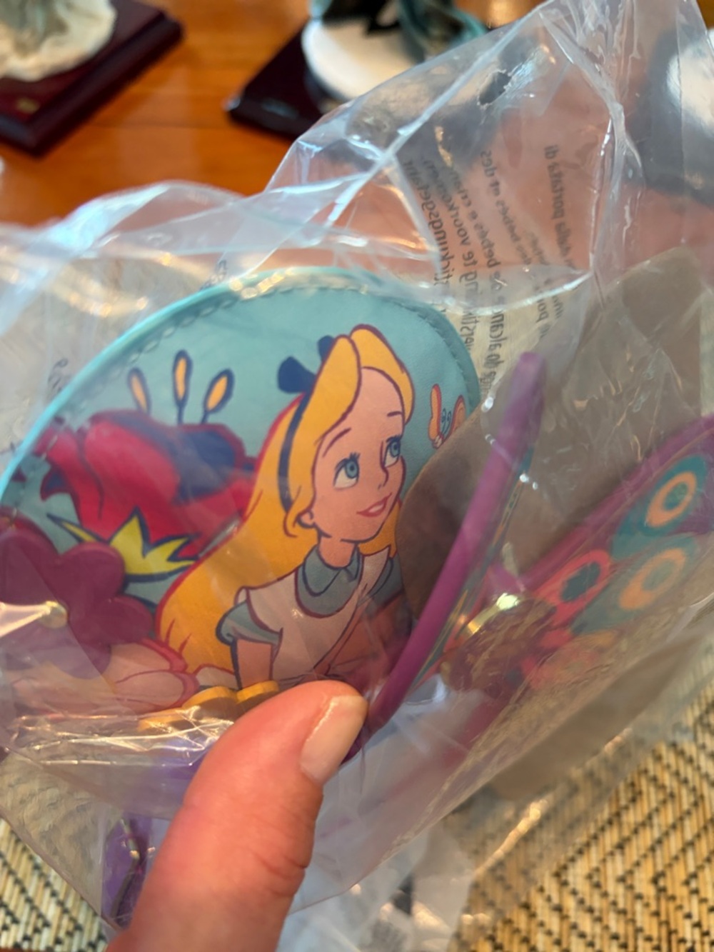 Disney Alice In Wonderland Epcot Purple Butterfly Headband with Floral Accents - Picture 9 of 10
